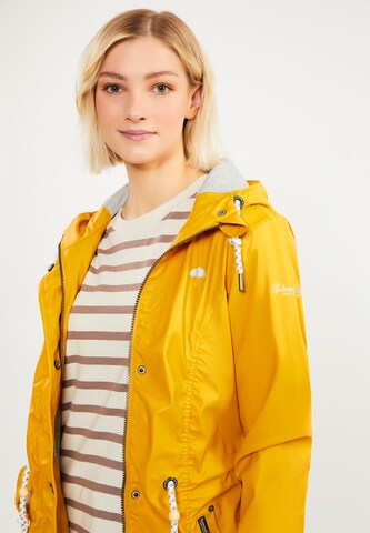 Manteau fonctionnel Schmuddelwedda en jaune