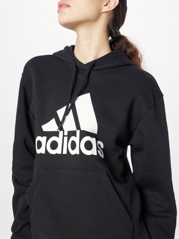 ADIDAS SPORTSWEAR Urheilullinen collegepaita 'Essentials' värissä musta