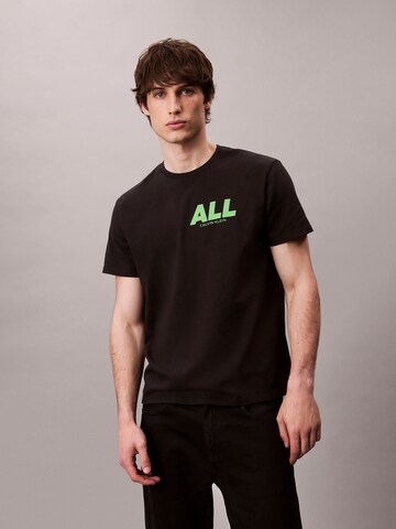 Calvin Klein Jeans Bluser & t-shirts '20S' i sort: forside