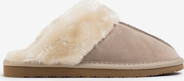 Minnetonka Hjemmesko 'Chesney' i beige