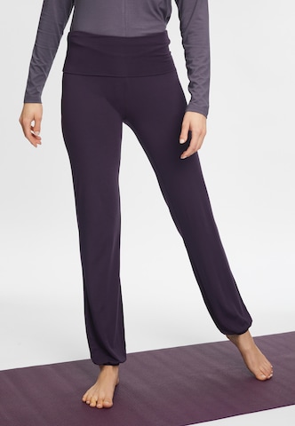 CURARE Yogawear Slim fit Workout Pants in Purple: front