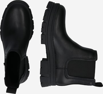 Boots chelsea di UGG in nero