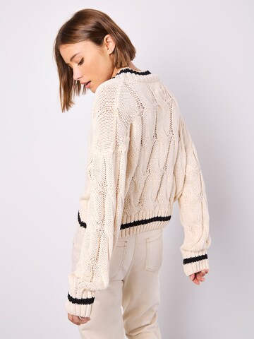 Pull-over ' ' Apricot en gris