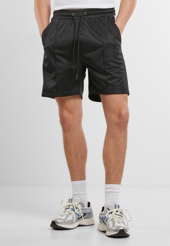 Urban Classics Regular Pants in Black: front