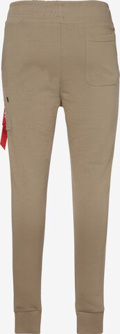 Effilé Pantalon 'X-Fit' ALPHA INDUSTRIES en beige