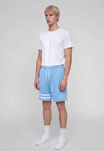 Pantaloncini da surf di Unfair Athletics in blu: lato
