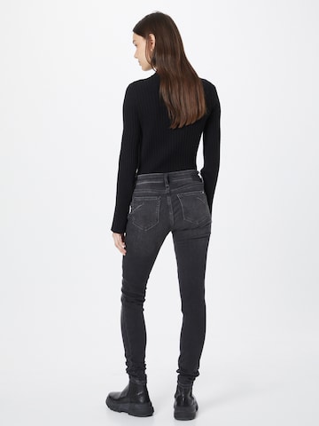 Mavi Skinny Jeans 'Adriana' in Schwarz