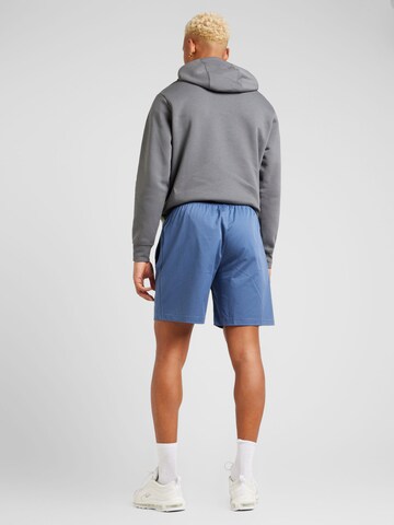 Nike Sportswear Regular Broek 'CLUB' in Blauw