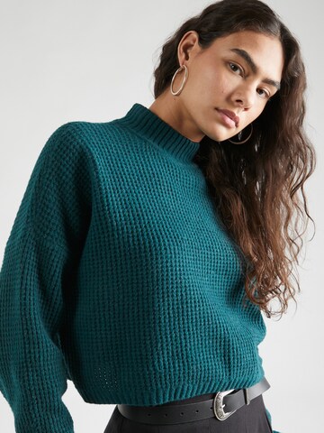 HOLLISTER Sweater in Green