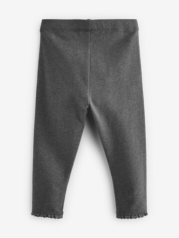 Skinny Leggings di Next in grigio