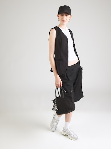 Monki Loose fit Pleat-front trousers in Black