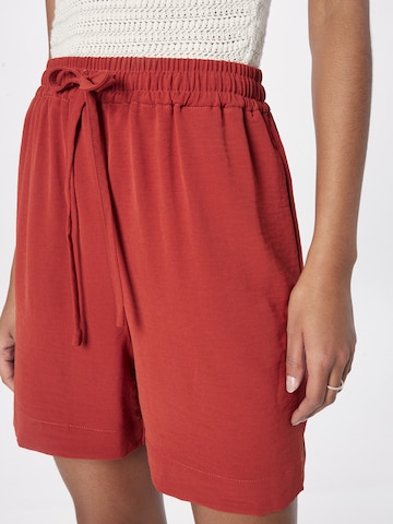 ABOUT YOU Loose fit Pants 'Jessie' in Red