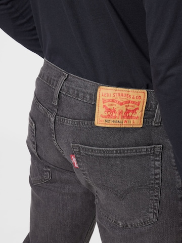 LEVI'S ® Tapered Jeans '502 Taper Hi Ball' in Grau