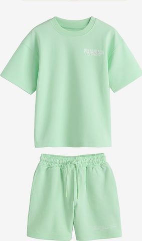 Next Set i grön: framsida