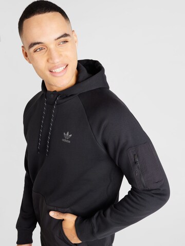 ADIDAS ORIGINALS Sweatshirt i svart