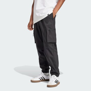 Tapered Pantaloni funzionali 'City Escape Premium' di ADIDAS SPORTSWEAR in nero: frontale