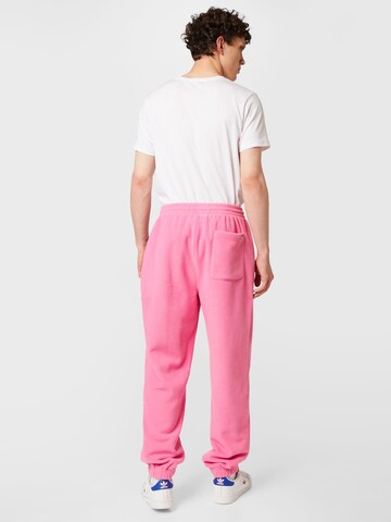 Tommy Jeans Tapered Broek in Roze