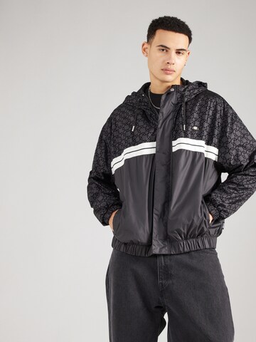 ELLESSE Between-season jacket 'Trezi' in Black: front