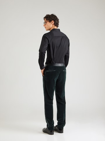 Slimfit Pantaloni cu dungă 'Genius Tux' de la BOSS pe verde