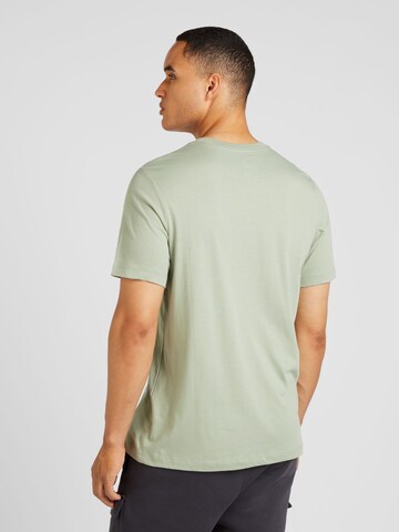 Nike Sportswear T-Shirt 'FUTURA' in Grün