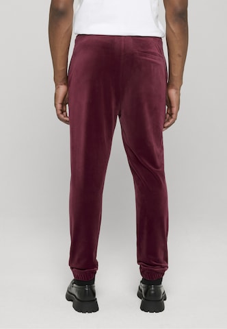 ROCAWEAR Zwężany krój Spodnie 'Austin' w kolorze czerwony