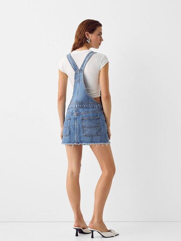 Bershka Dungaree skirt in Blue