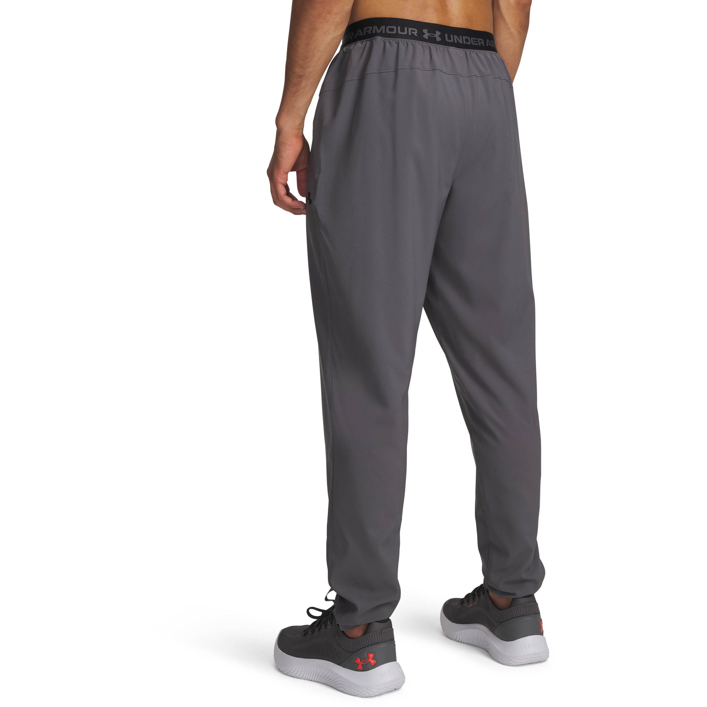UNDER ARMOUR Tapered Workout Pants in Grey