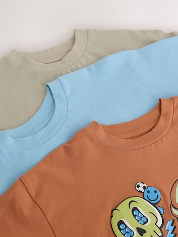 Tricou de la Next pe albastru