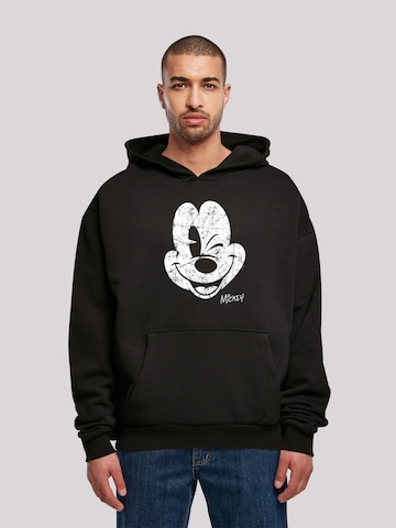 Sweat-shirt 'Disney Mickey Mouse Since Beaten Face' F4NT4STIC en noir : devant