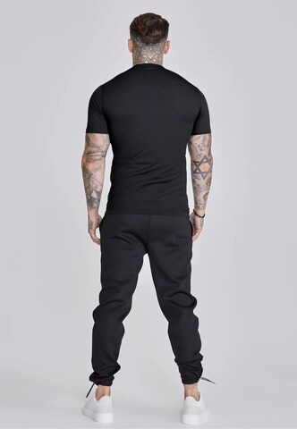 SikSilk - Camiseta 'Tech' en negro