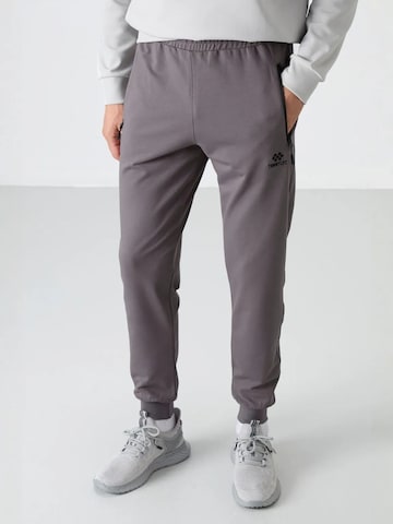 Pantaloni di Tommy Life in grigio: frontale