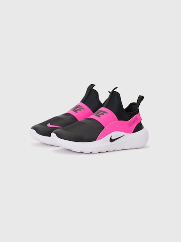 Scarpa sportiva 'FLEX RUNNER 4' di NIKE in nero