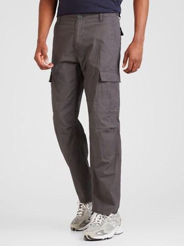 Carhartt WIP Loose fit Cargo trousers in Grey: front