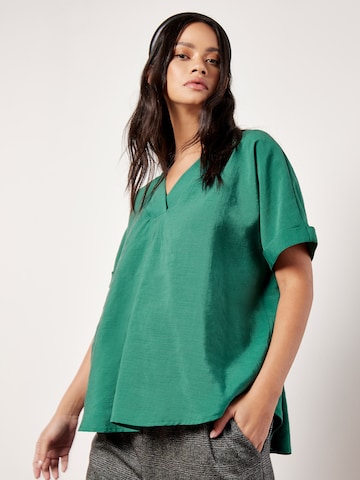 Chemisier Apricot en vert : devant