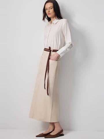 Touche Prive Rock in Beige