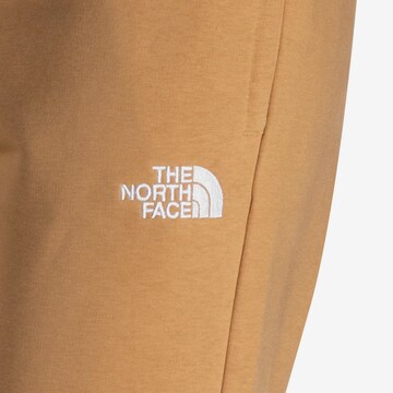 THE NORTH FACE Tapered Sporthose in Beige