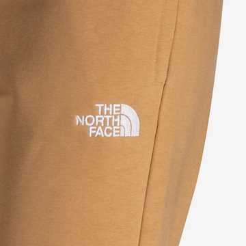 THE NORTH FACE Tapered Workout Pants in Beige