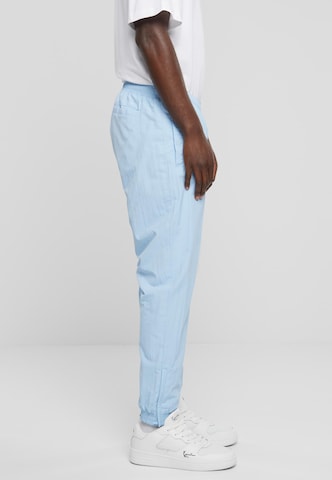 Effilé Pantalon Karl Kani en bleu