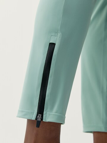 Effilé Pantalon de sport 'Airla' Born Living Yoga en vert