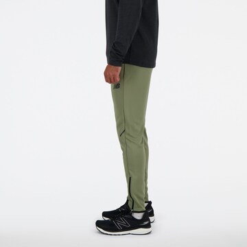 new balance Tapered Sportbroek 'Tenacity' in Groen