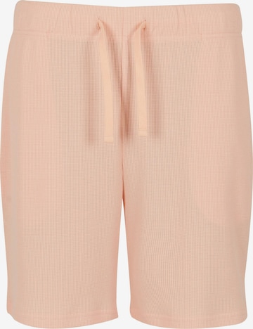Pantaloni di Urban Classics in arancione: frontale
