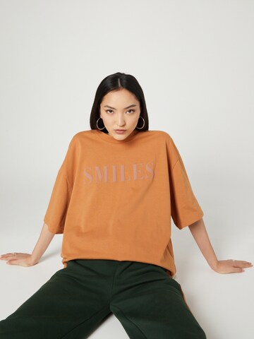 T-Shirt 'Kalle' Smiles en orange