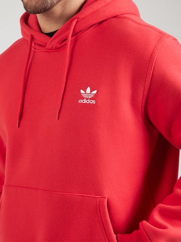 ADIDAS ORIGINALS Sweatshirt 'Essentials' i rød