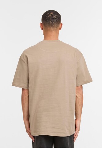 Karl Kani T-Shirt 'Small Signature Essential' in Braun
