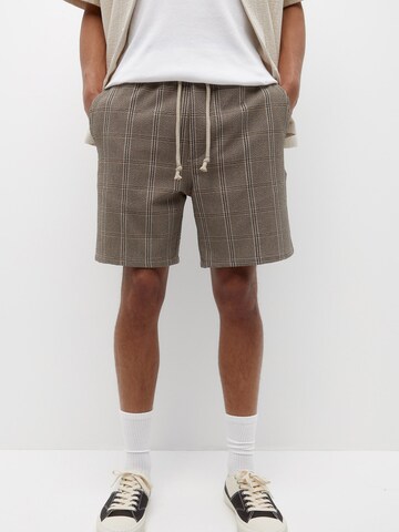 Pull&Bear Normalny krój Spodnie w kolorze brązowy