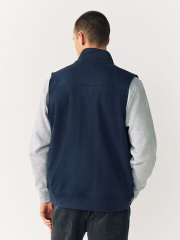 Next - Chaleco en azul