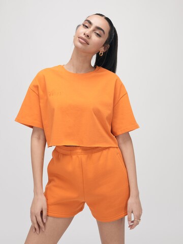 ABOUT YOU x VIAM Studio Shirt 'ADDISON' in Orange: front