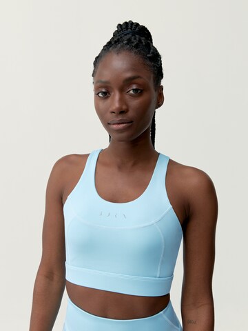 Born Living Yoga Sports top ' Becky ' in Blue: front