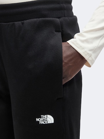juoda THE NORTH FACE Siaurėjantis Sportinės kelnės