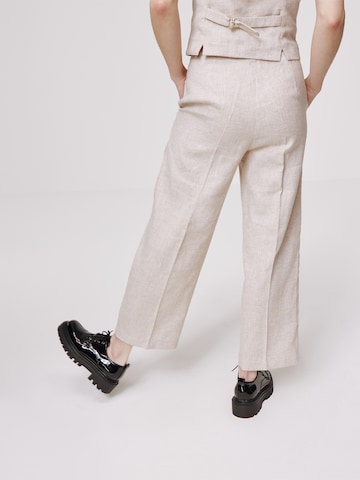 Loosefit Pantaloni cu dungă 'Isabell' de la Daahls by Emma Roberts exclusively for ABOUT YOU pe bej